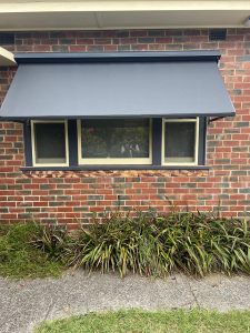 Pivot arm awnings