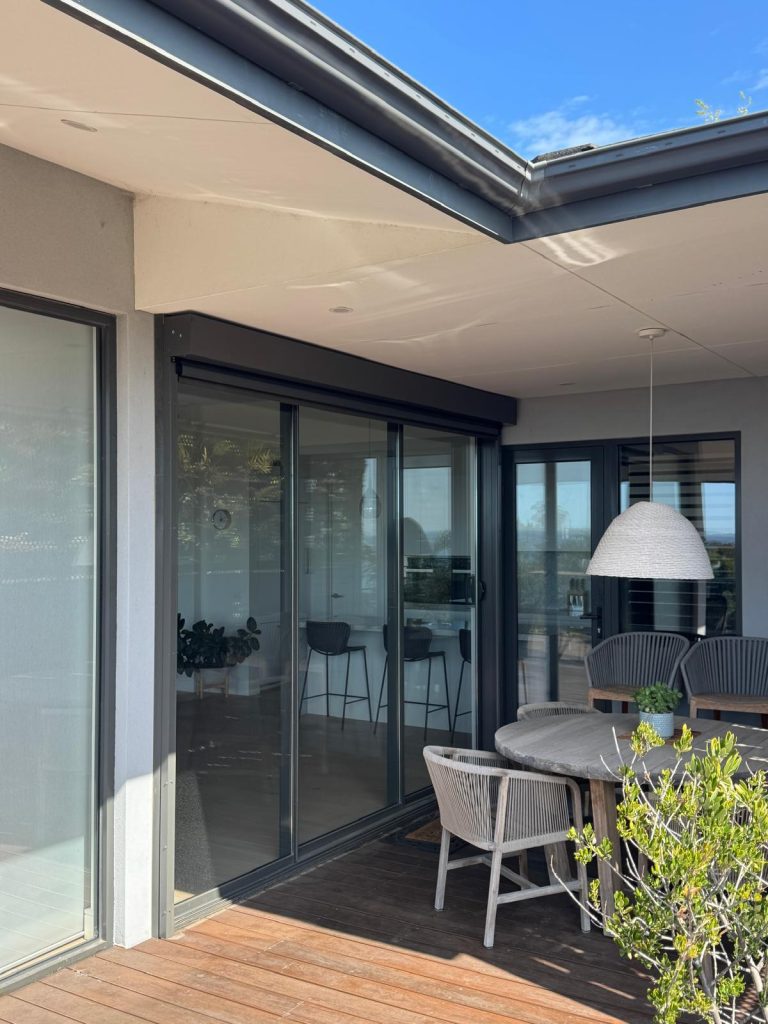 Our client in Mt Martha had tried a number of different solutions to block insects, maintain their view of Port Phillip but still allow airflow through their sliding doors but none could stand up to the conditions atop the Mount. We installed motorised Ziptrak blinds with an 80% block mesh to allow airflow, brilliant visibility but still keep out the insects and standup to the rigours of the coastal winds.